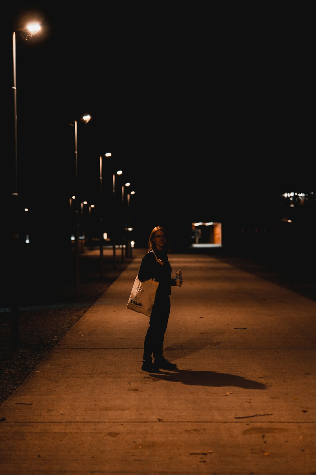 woman walking alone at night